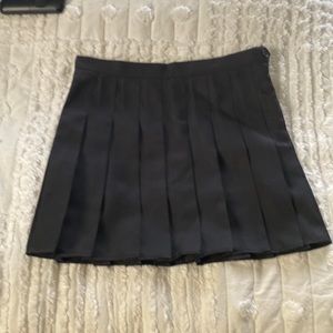 Black pleated skirt. Fully lined!